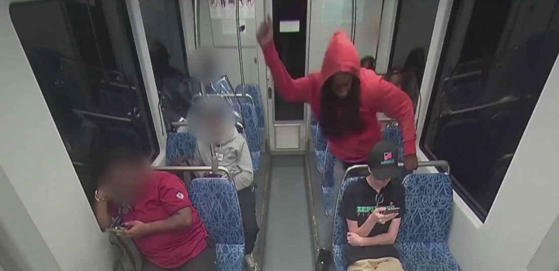 A person being attacked on a public bus, illustrating the danger of unsafe public spaces